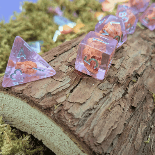 Pink Skull Inclusion Dice Set