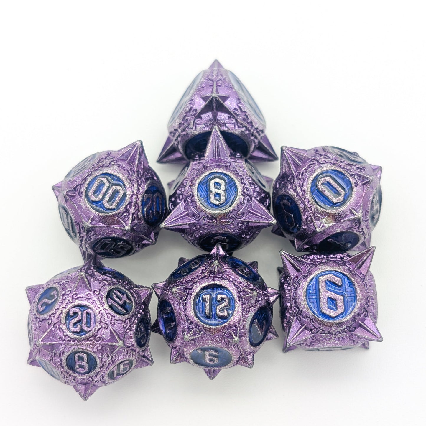 Caltrops Purple and Blue Metal Core Dice Set