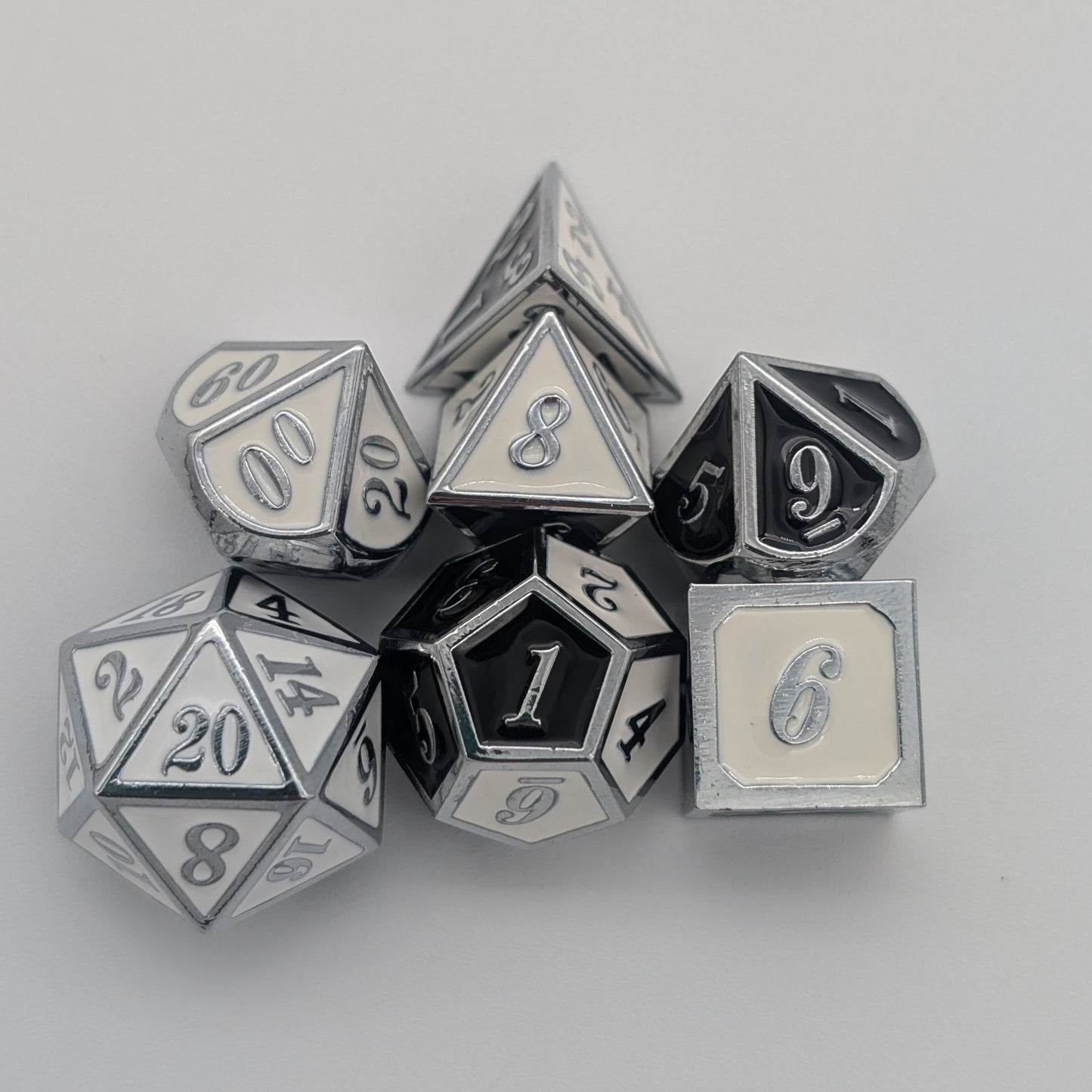 Dual Tone Black White and Silver Metal Core Dice Set