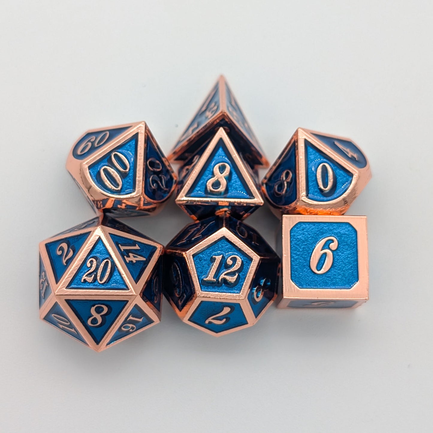 Blue and Rose Gold Metal Dice Set