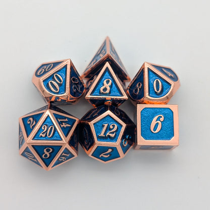 Blue and Rose Gold Metal Dice Set