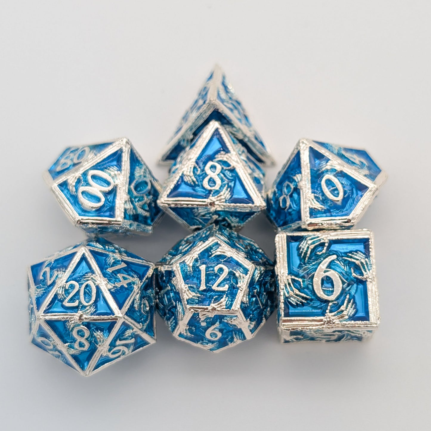 Skeleton Silver and Blue Metal Core Dice Set
