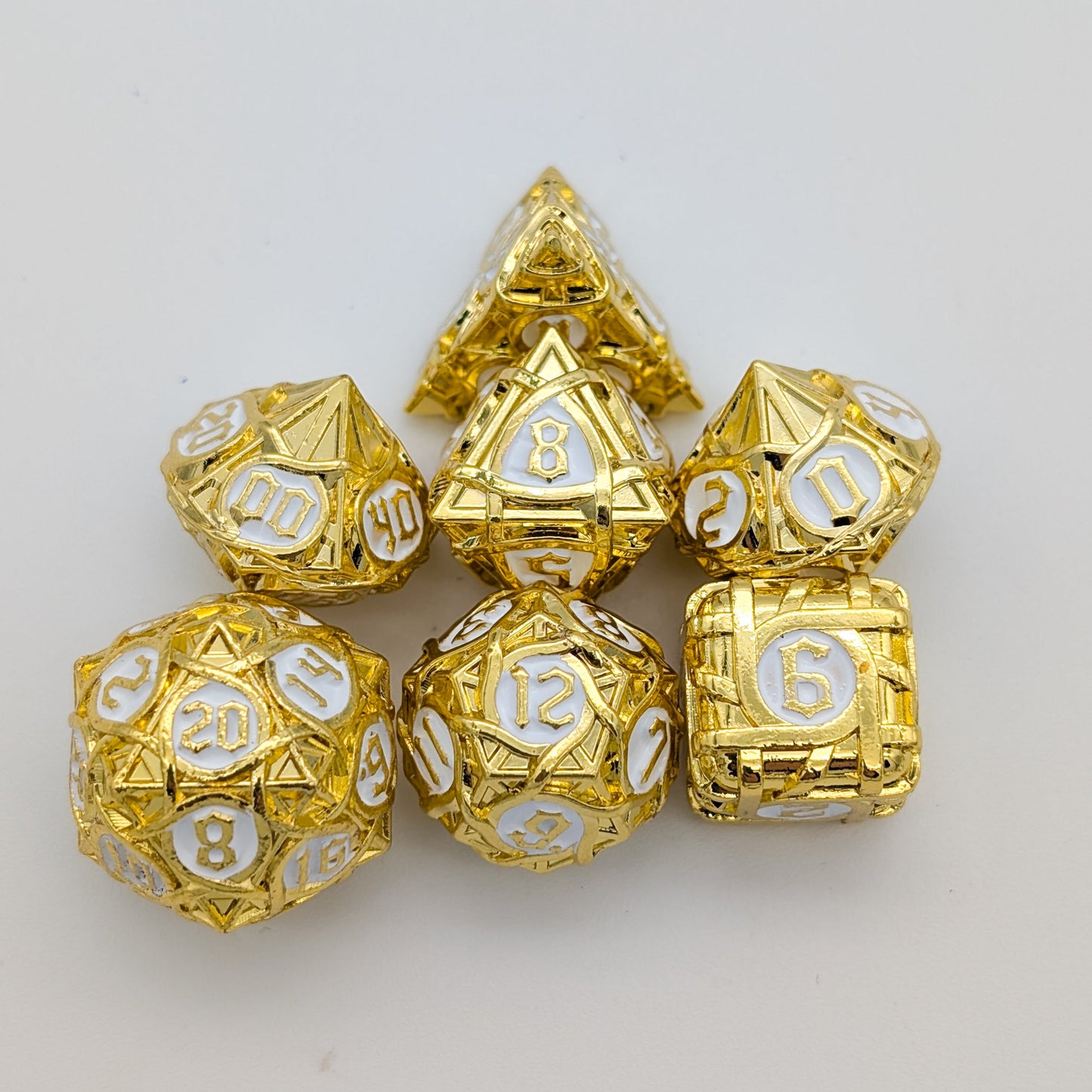 Thorns Gold and White Metal Core Dice Set