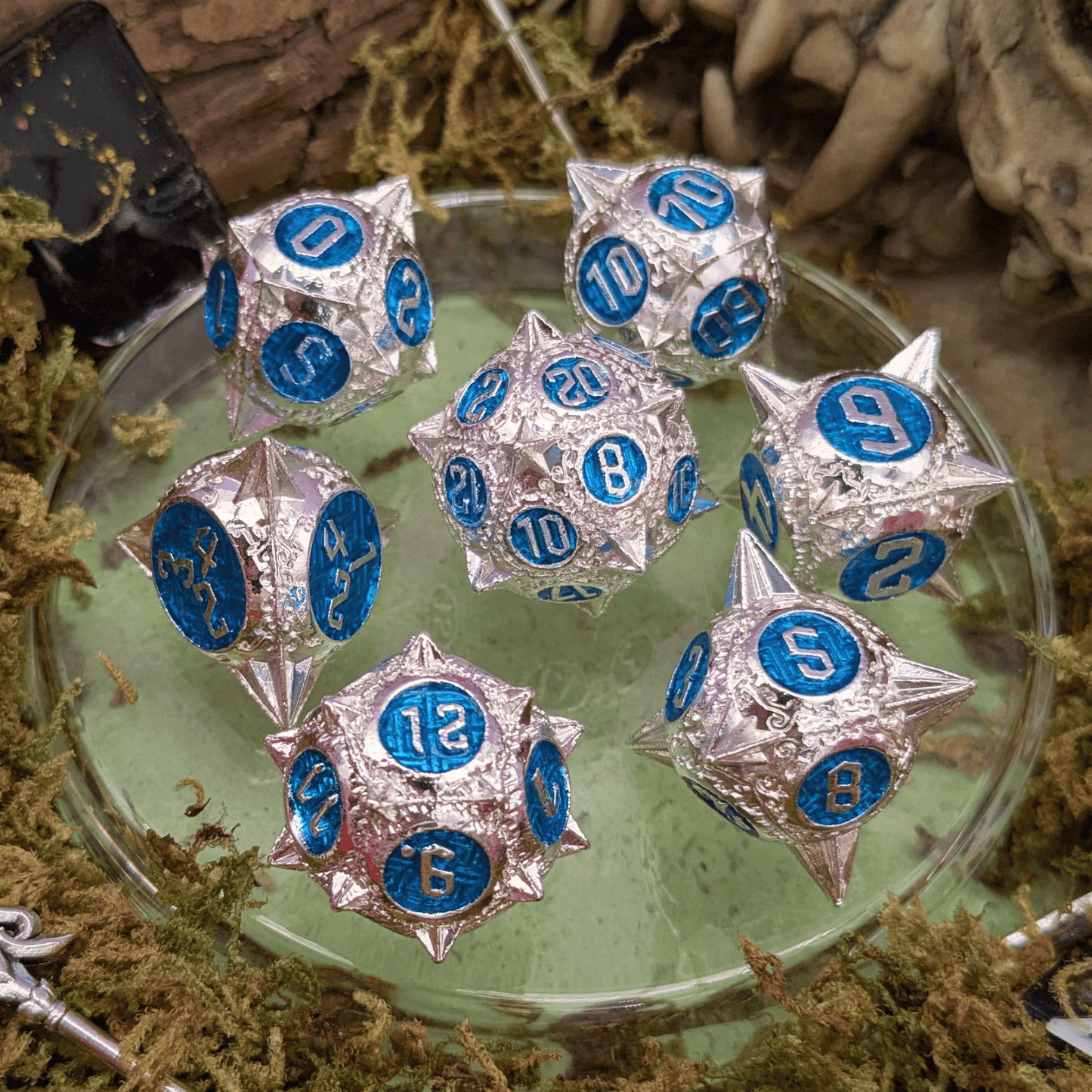 Caltrops Silver and Blue Metal Core Dice Set