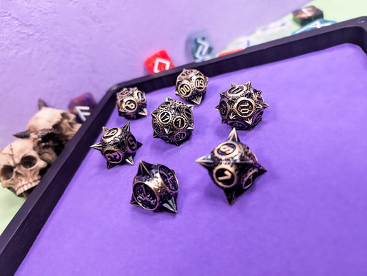The Titan's Tribute | Metal Caltrop Dice Set