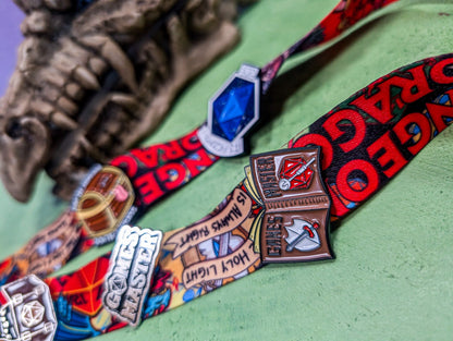 Games Master Book Pin
